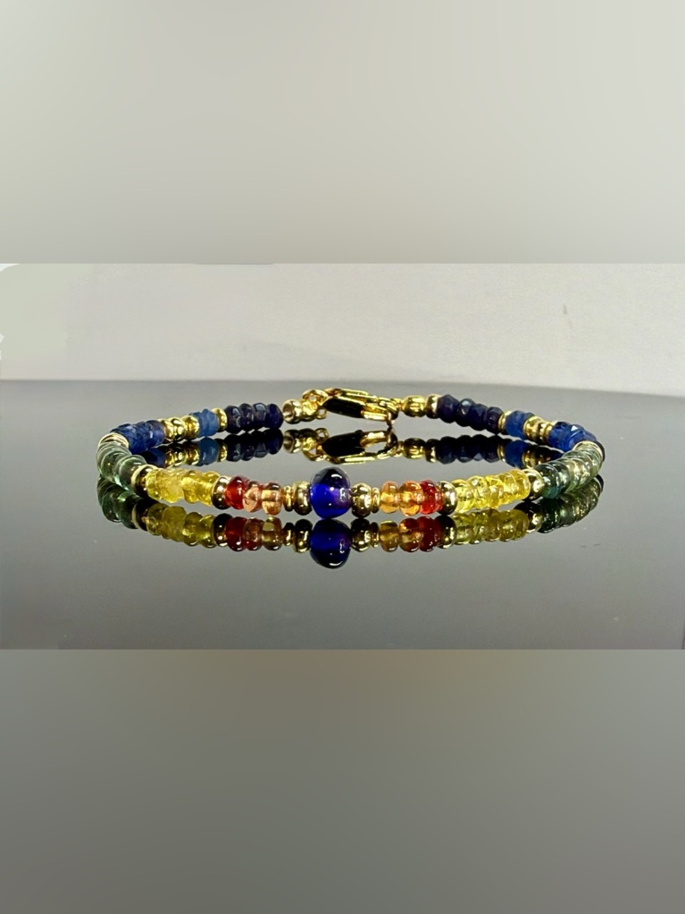 One of a kind multicolored sapphire bracelet in 18k gold vermeil.